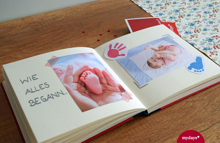Aufgeschlagenes Buch Babyfotos